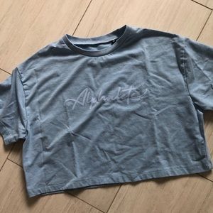 Alphalete Women’s Cropped Tee